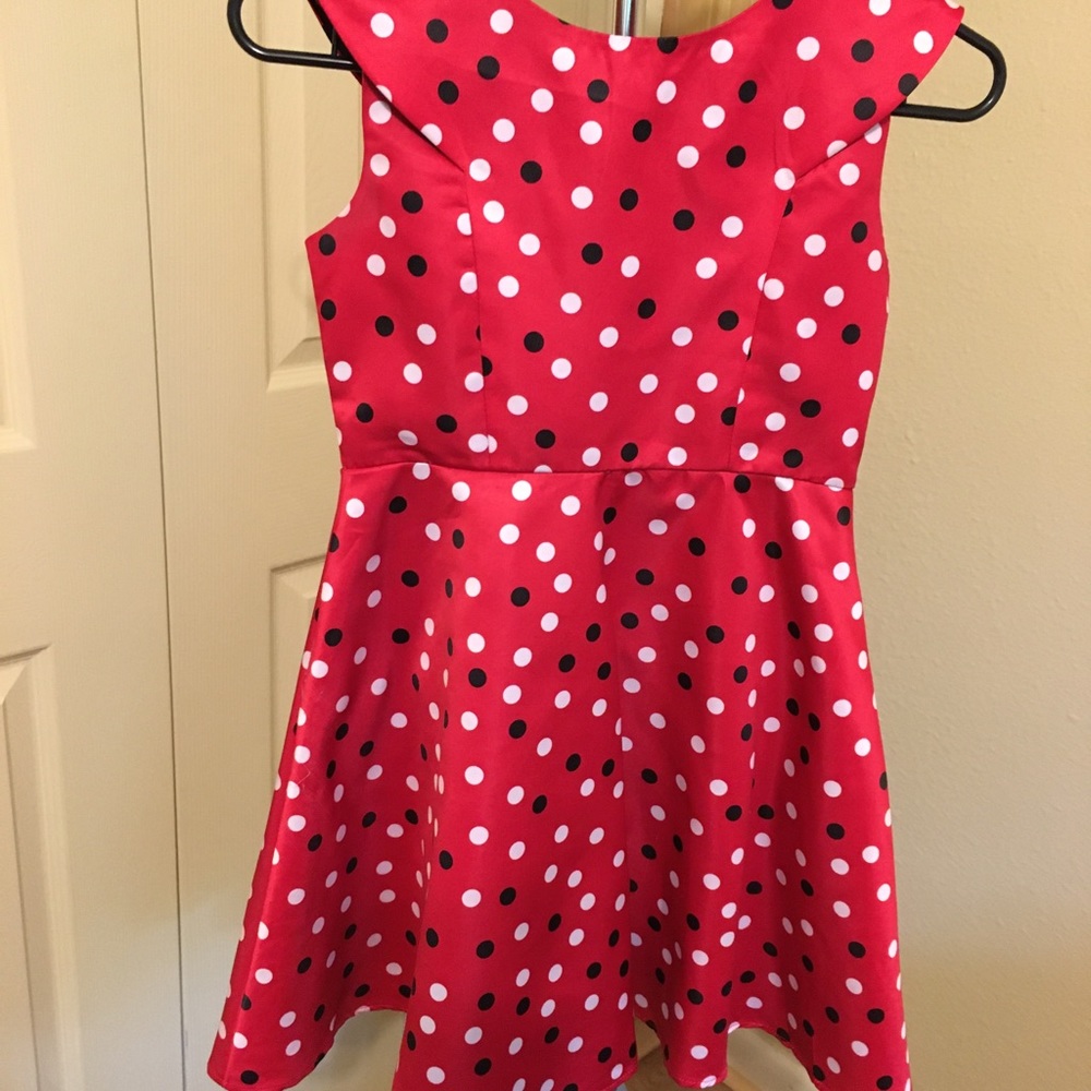 Disorderly Kids 100% red Polyester dress.